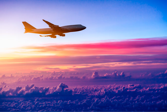 Fotomural vinilos avión en las nubes